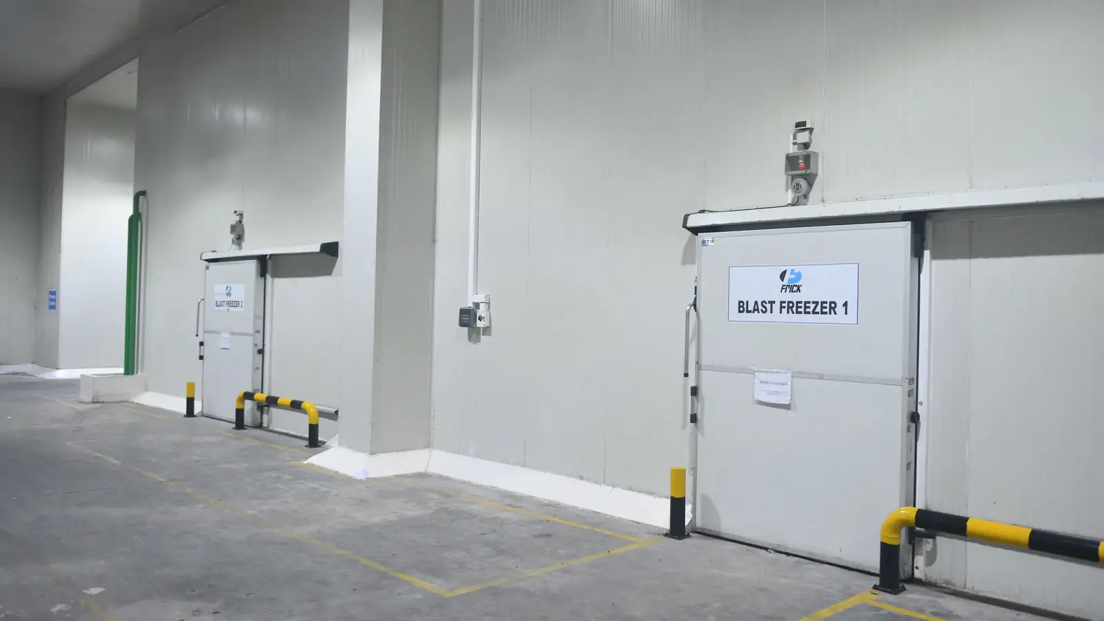 Blast freezer chamber doors on the cold-chain floor