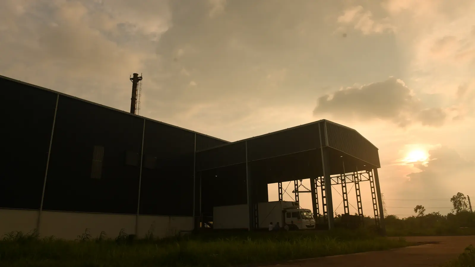 Dispatch bay and campus sheds at sunset