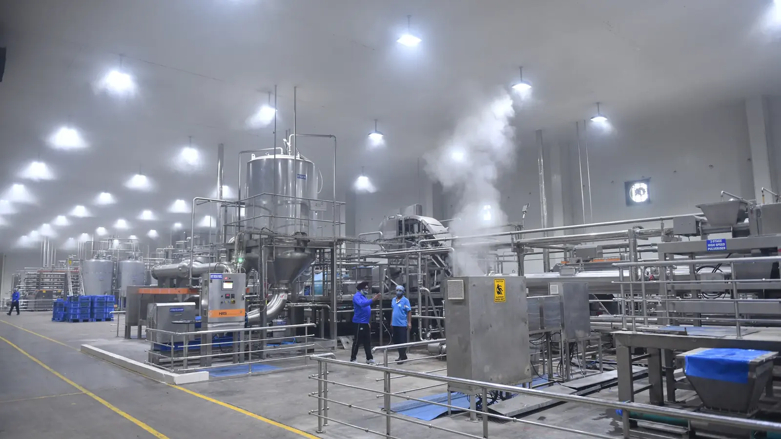 Live processing hall with stainless equipment and steam