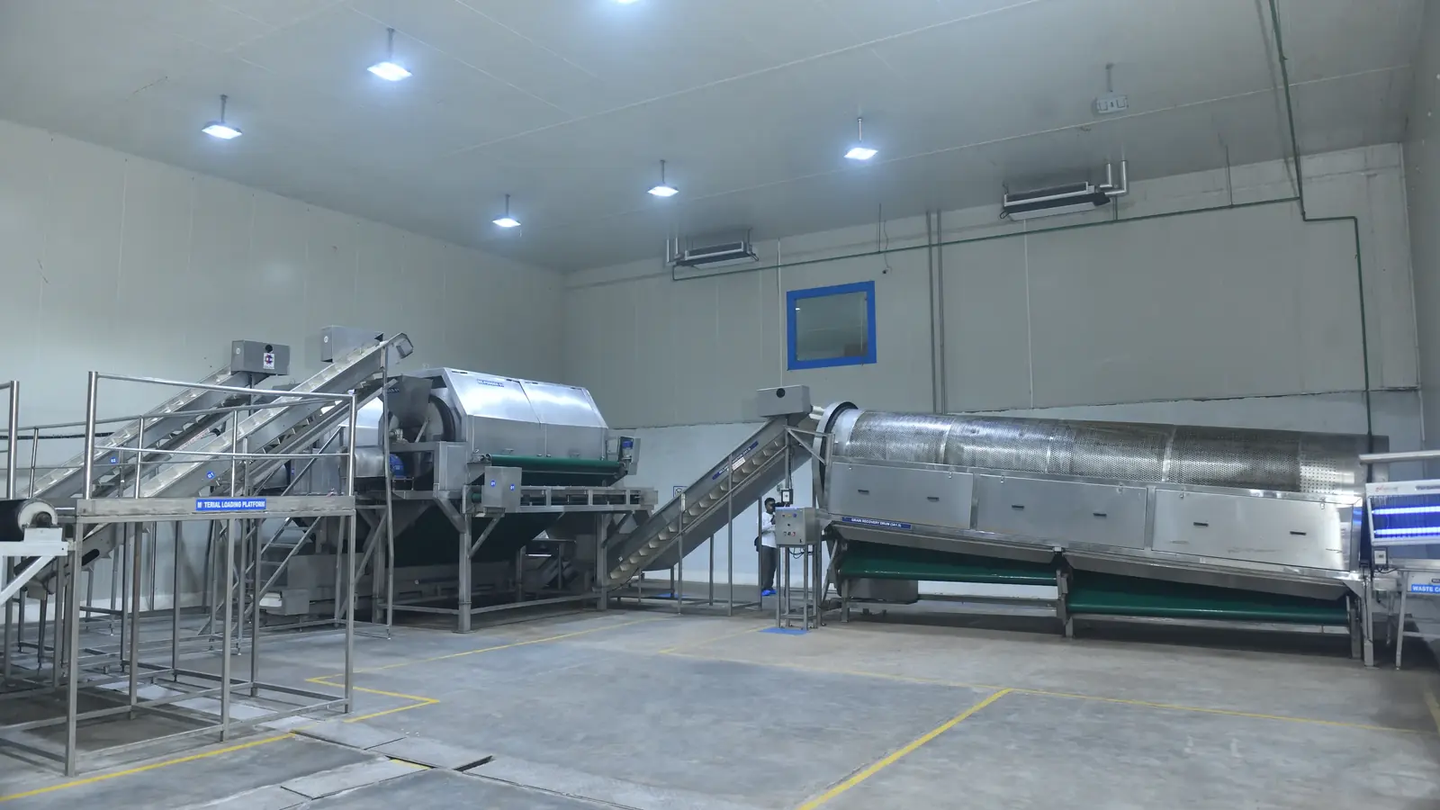 Rotary drum washers and inspection belts on the intake line