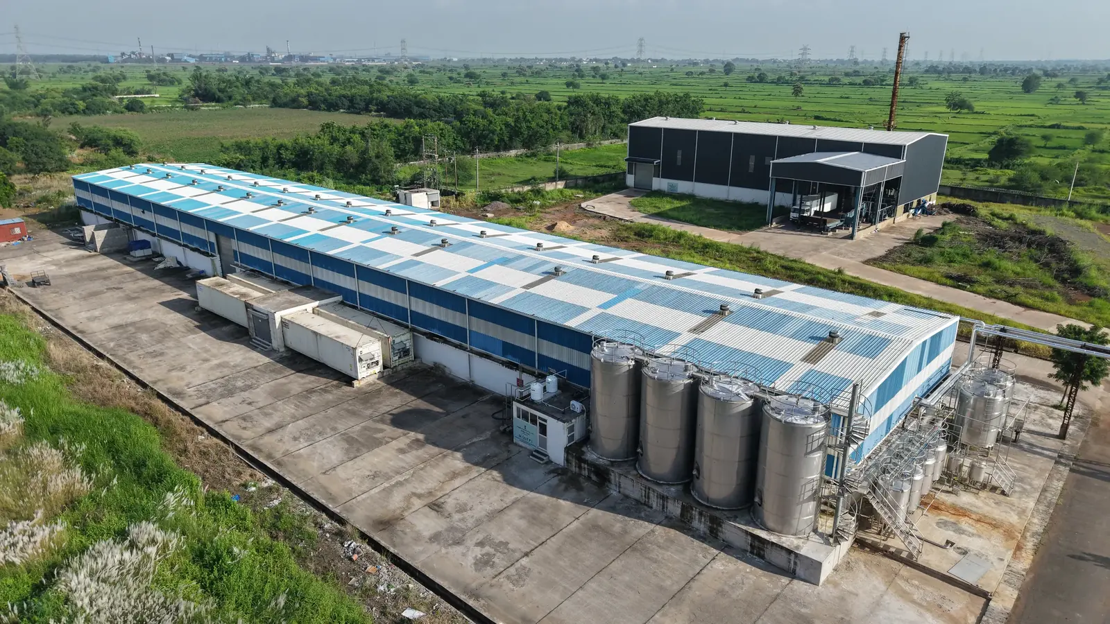 Aerial view of tank facility and campus road